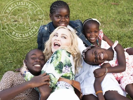 Мадонна с приемными детьми